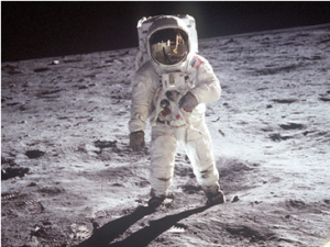 Buzz Aldrin takes a stroll on the moon, partly thanks to John Kennedy. NASA