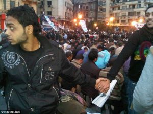 Christians protecting Muslims in Tahrir Square, 2011