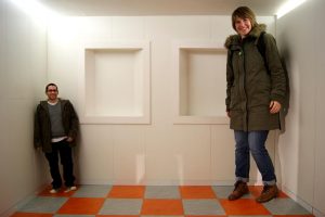 Ames Room illusion. This is not Photoshopped. See explanatory video below. Photo Credit: Ian Stannard / Flickr (CC BY-SA 2.0)