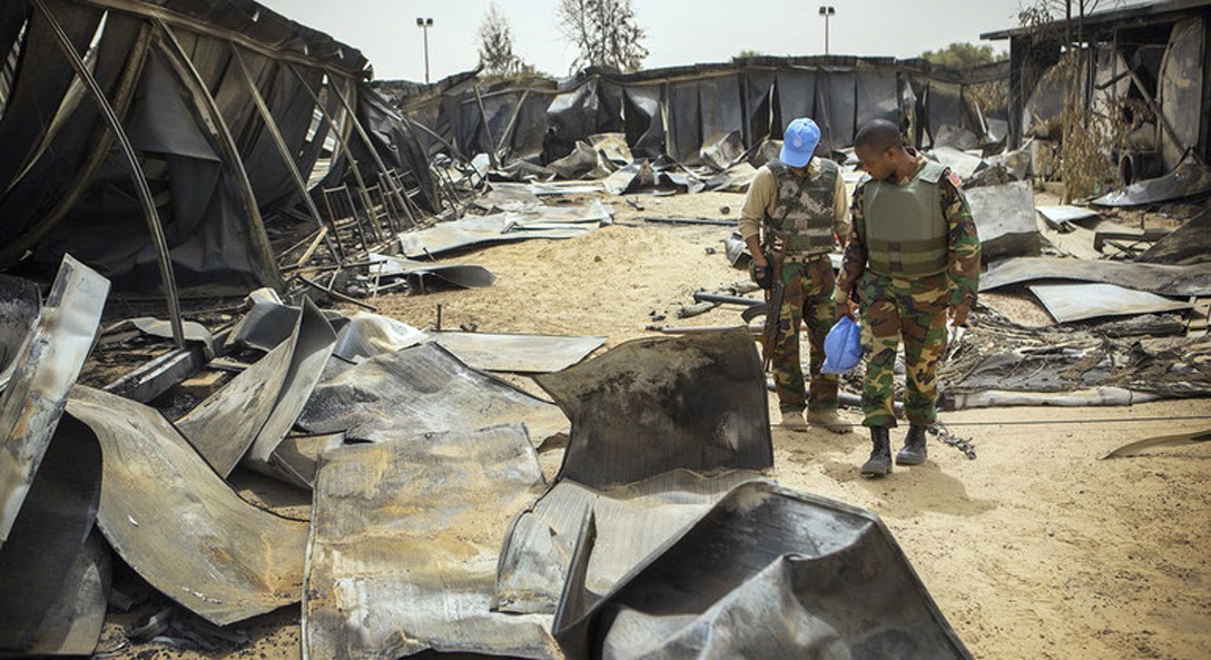 United Nations peacekeeping forces inspecting war damage in Liberia
