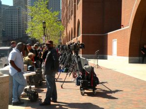 Reporters line up outside the courthouse in Boston where the Marathon bombing trial took place. None have yet spoken with Viskhan Vakhabov, who declined to testify at the trial though he received a phone call from the convicted bomber immediately following the attacks. Photo credit: Jill Vaglica