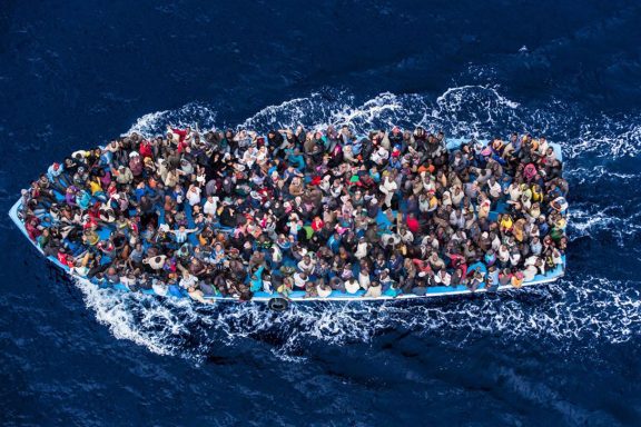 Migrants on fishing boat