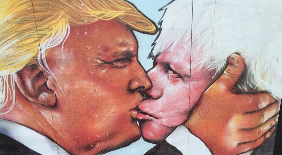 Donald Trump kissing Boris Johnson