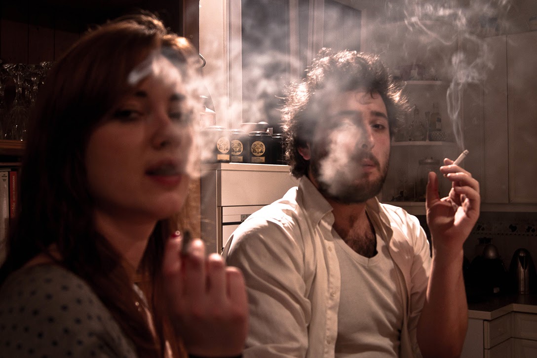 man, woman, smoking