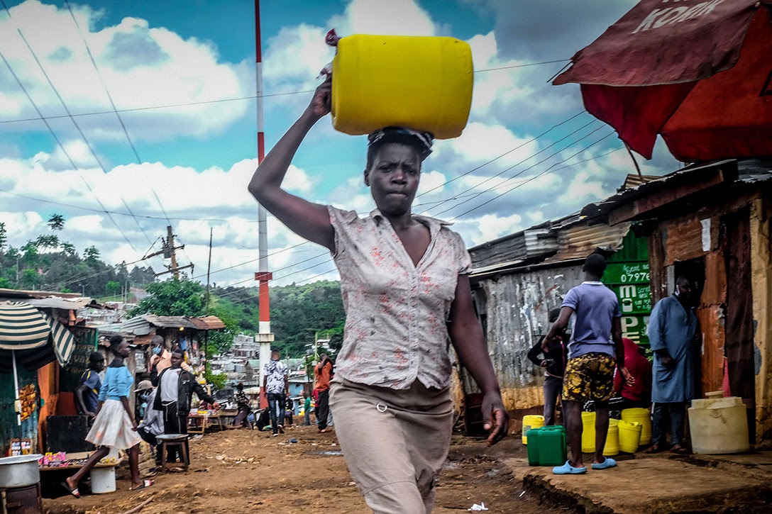 woman, Nairobi, Kenya, poverty, coronavirus