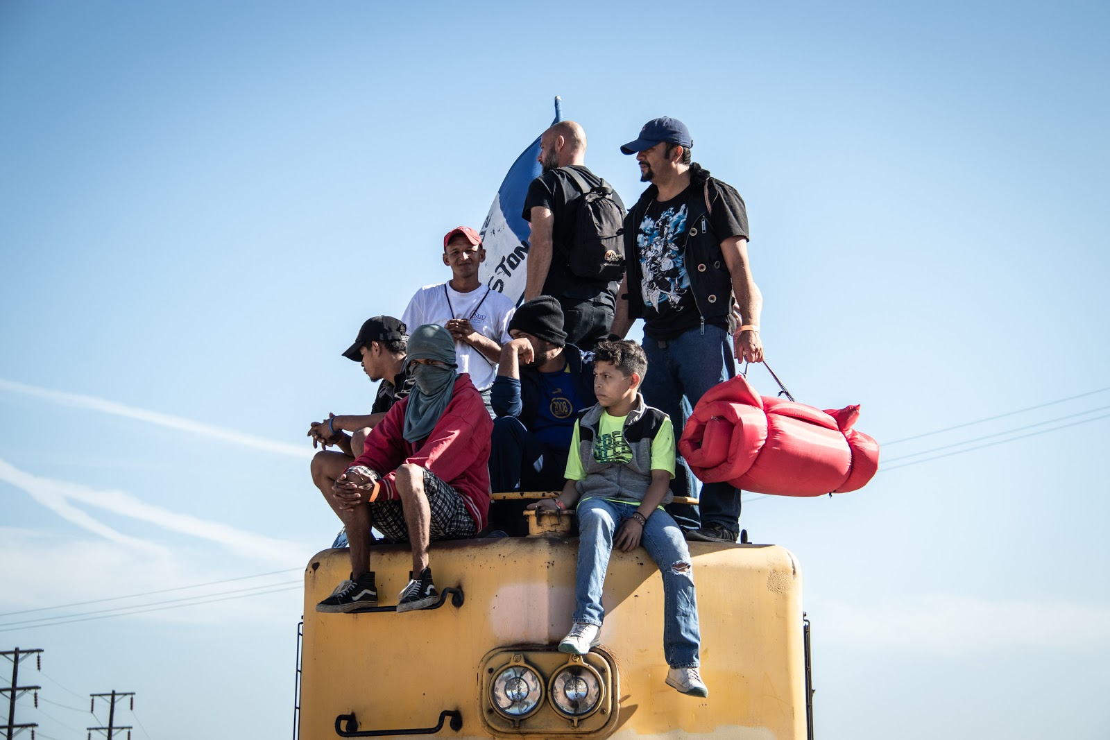 Migrants, Honduras, atop train