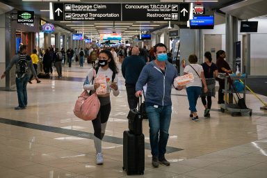 Travelers at Hartsfield-Jackson Atlanta International Airport.