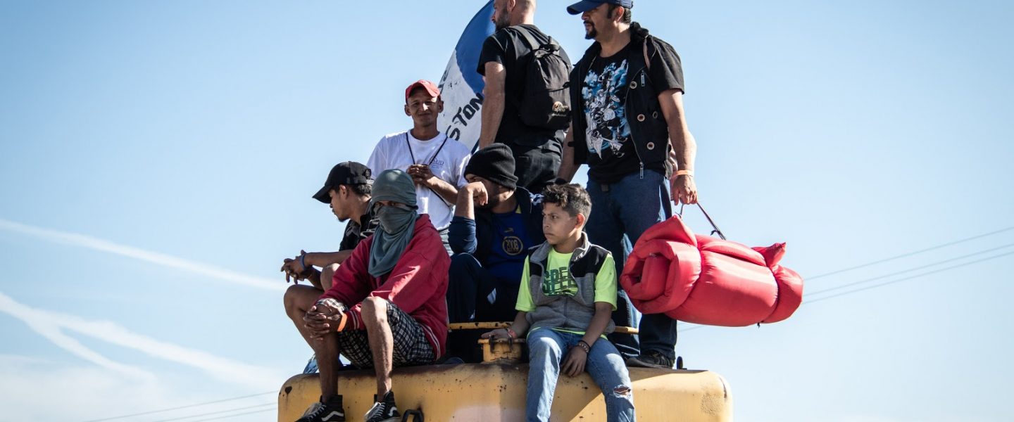 Migrants, Honduras, atop train