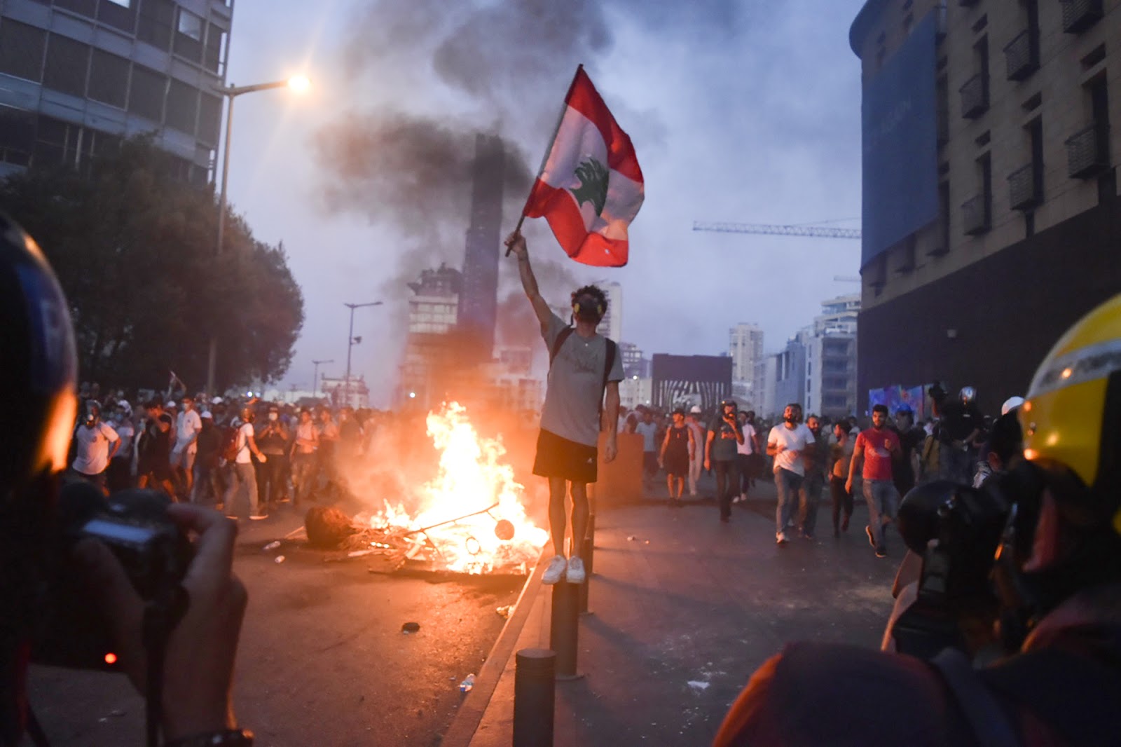 demonstrator, waves flag, Beirut, Lebanon