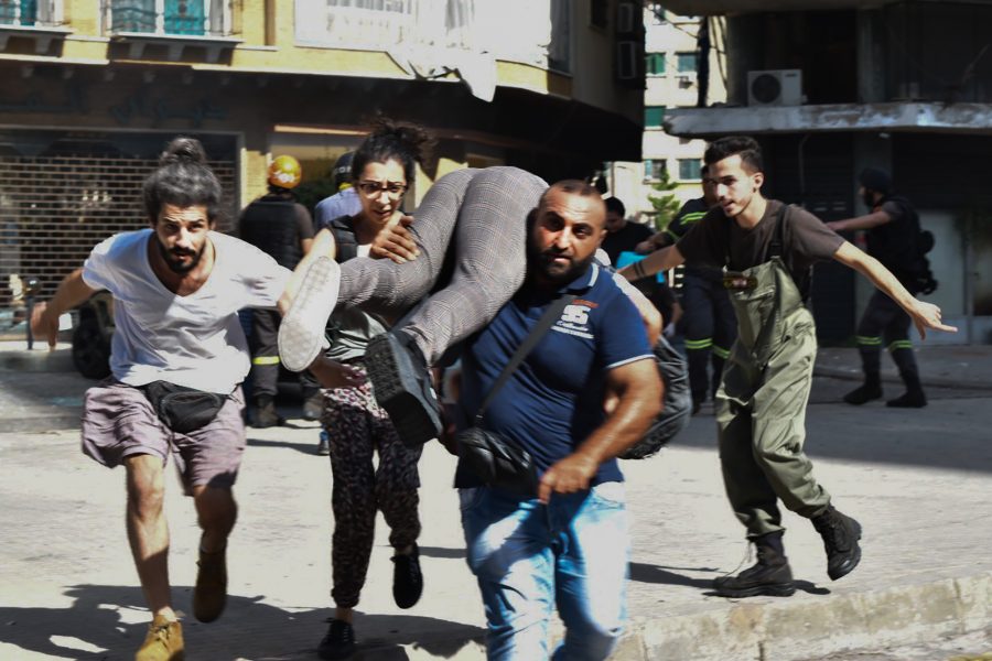 Civilians trapped, running, Beirut