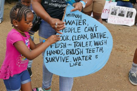 Flint water crisis, historic settlement, lead contaminated water, Michigan