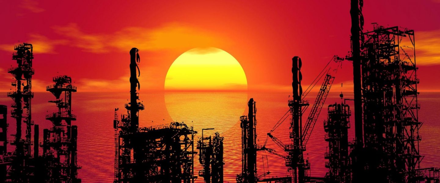 Oil refinery, sunset