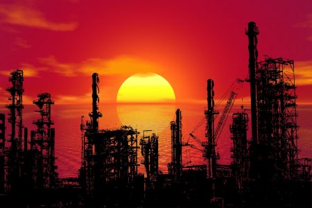 Oil refinery, sunset