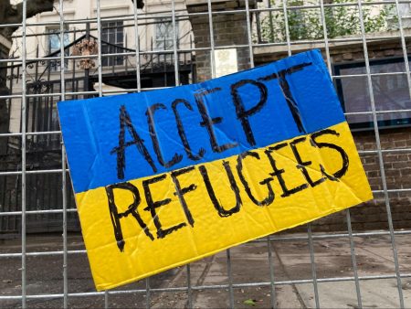 accept refugees, sign