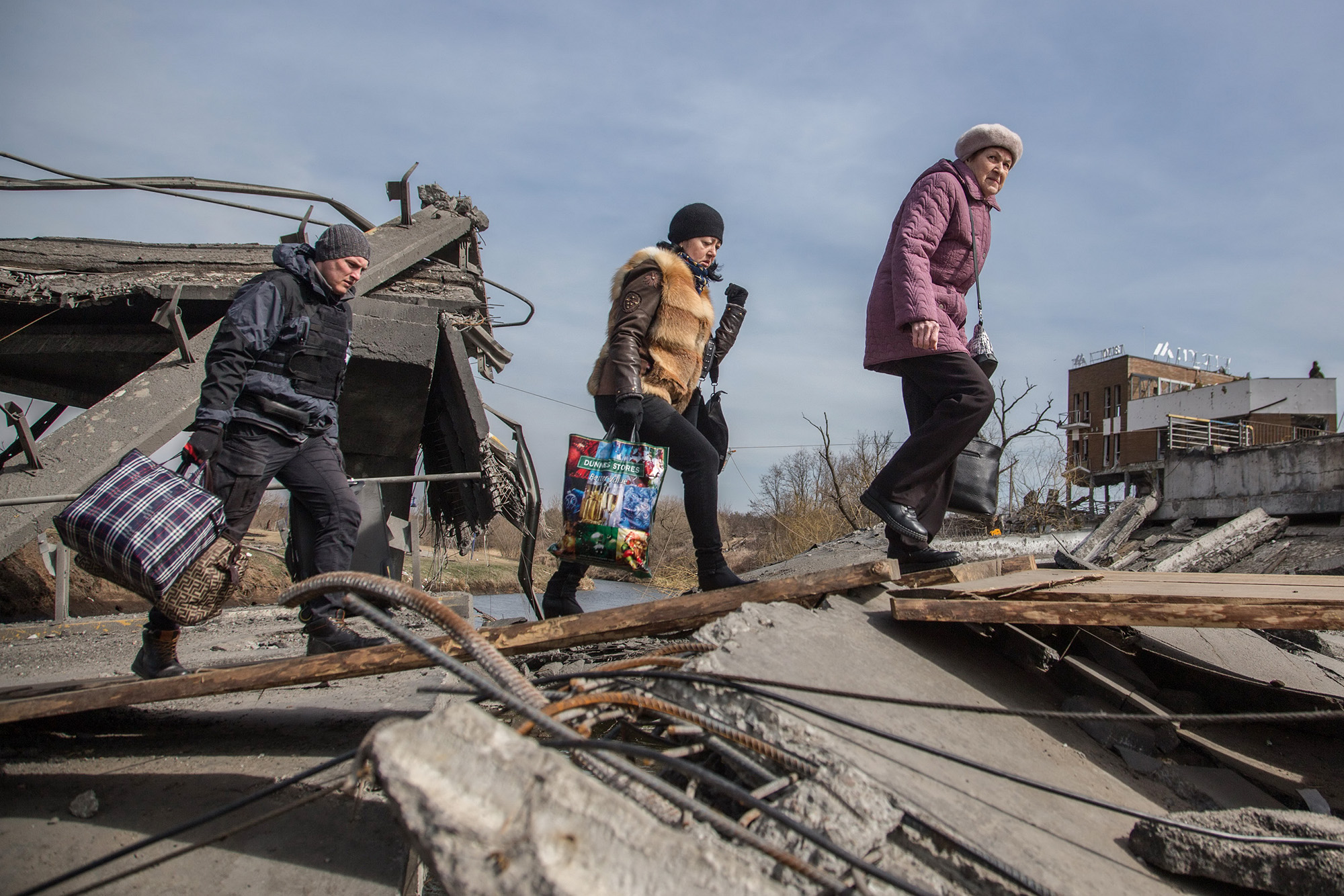 Ukraine, Two Women, Soldier, wreckage