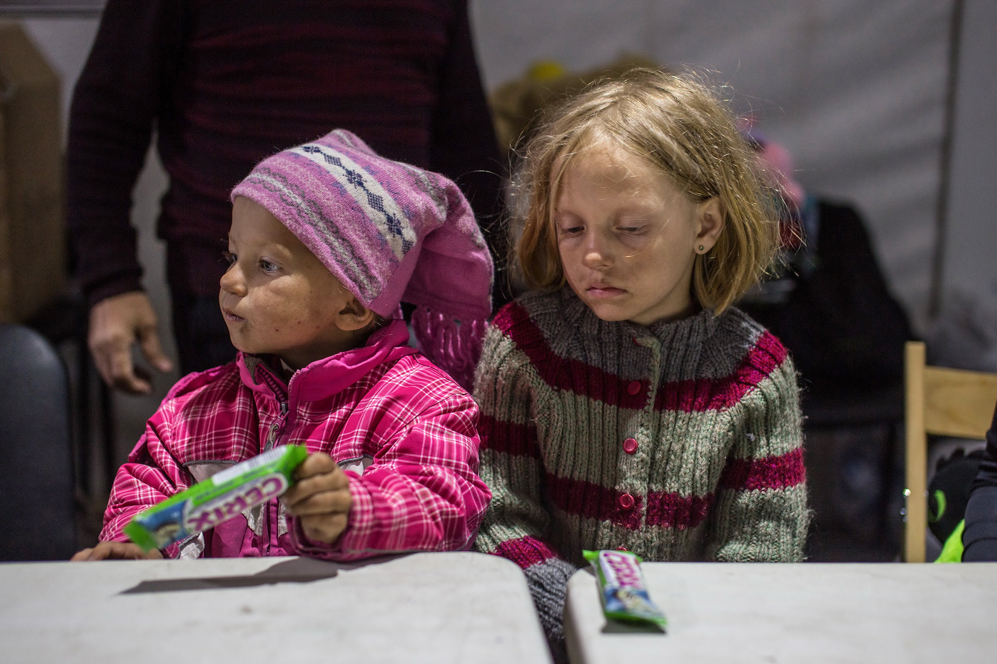 Two children, escape Mariupol, Ukraine
