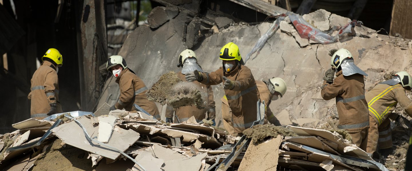Firefighters remove debris, Kremenchuk