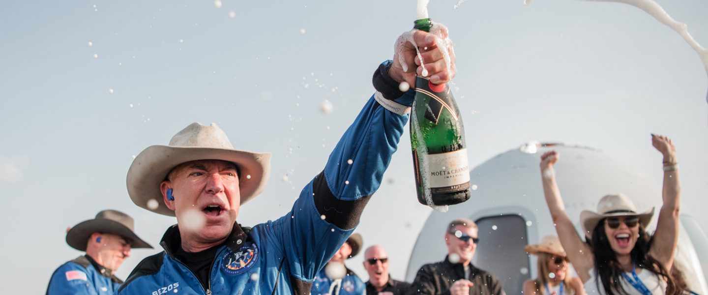 Jeff Bezos, Blue Origin, celebrates