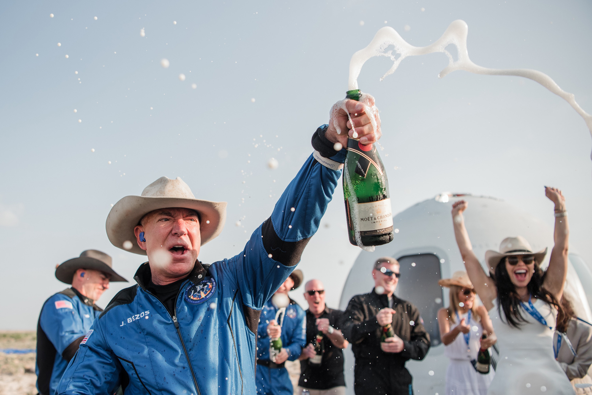 Jeff Bezos, Blue Origin, celebrates