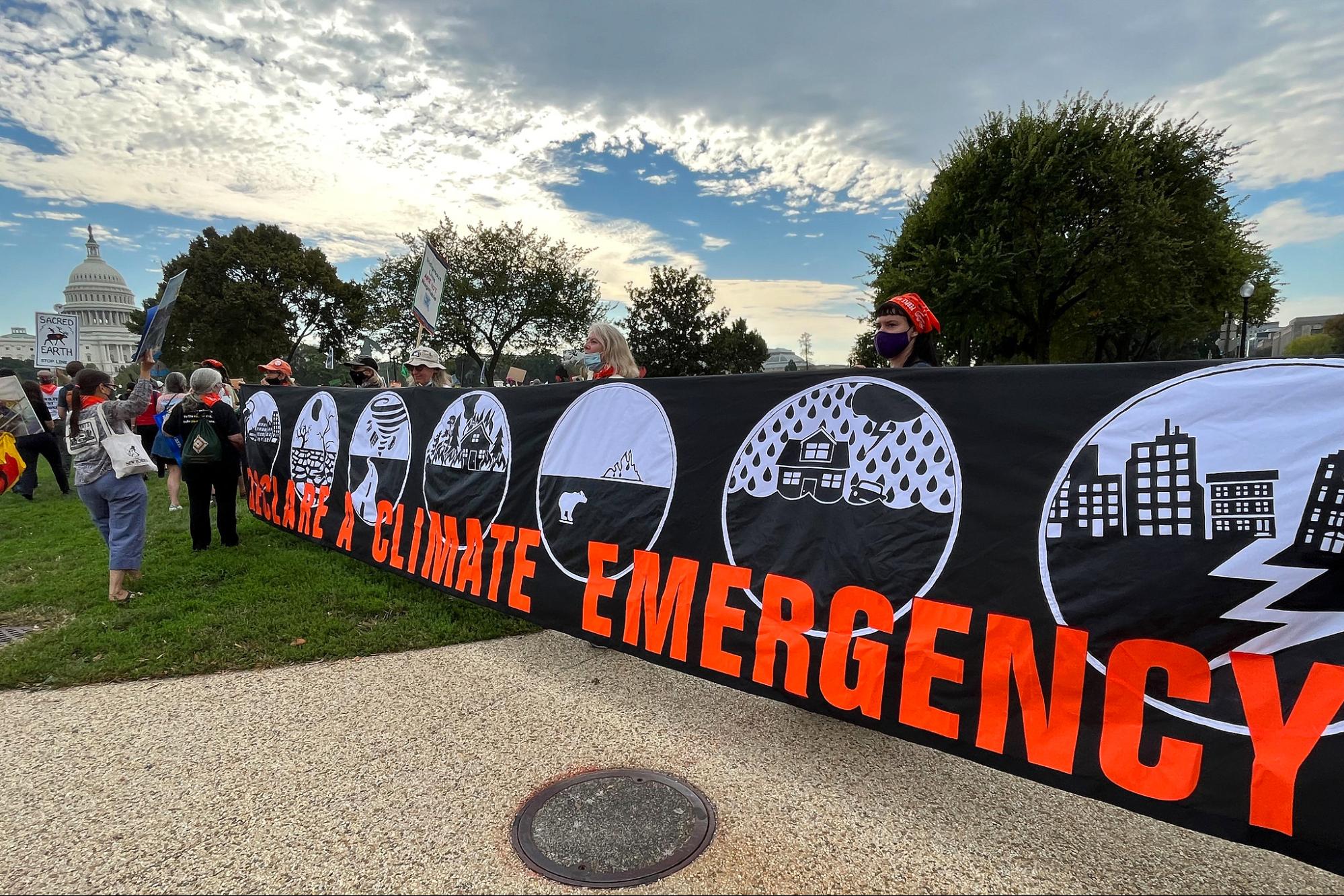 climate crisis, global warming, eco-activists, carbon emissions, luxury lifestyles, protests