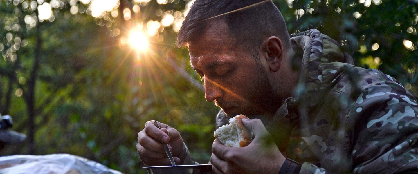 Ukrainian soldier, eats