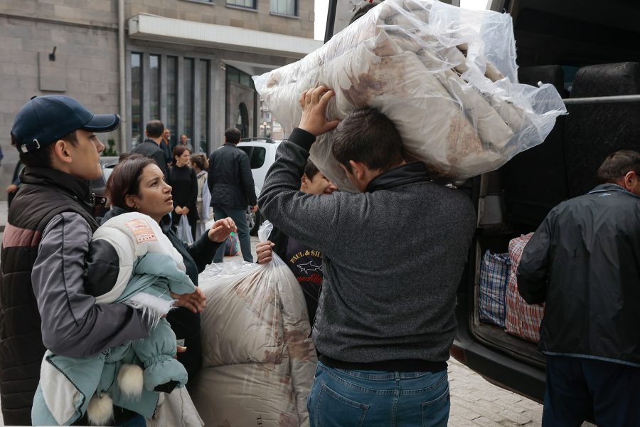 Delivering emergency supplies, refugees.