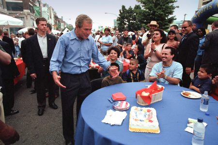 George W Bush, crowd, applauds, birthday cake