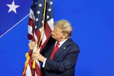 Donald Trump, hugs, American flag