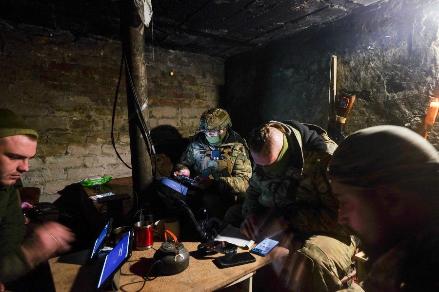 Drone pilot, navigates, device, fire control site, trenches, Ukraine,115th Mechanized Brigade