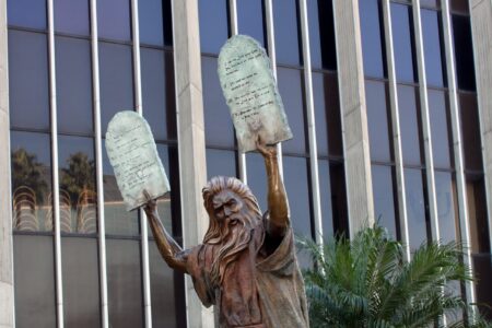 Moses holding ten commandments