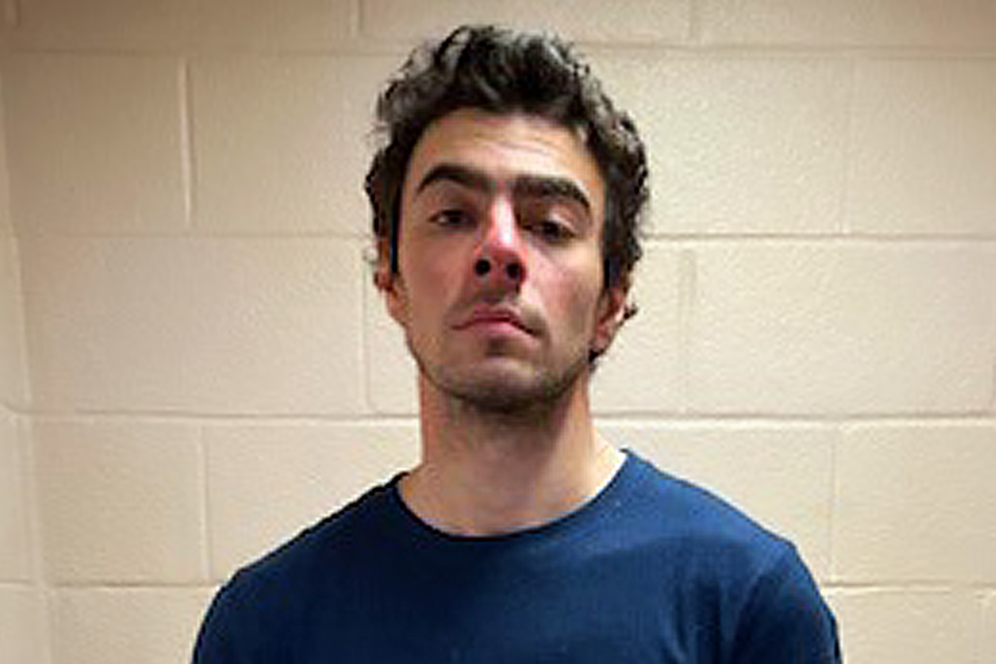 Luigi Mangione in a holding cell in Altoona, PA.