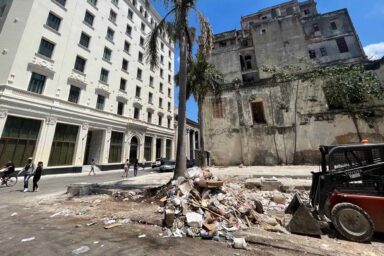 Trash piles, street, Havana
