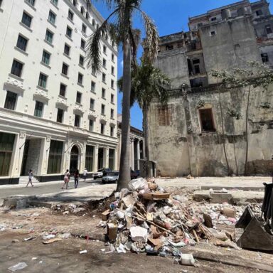 Trash piles, street, Havana