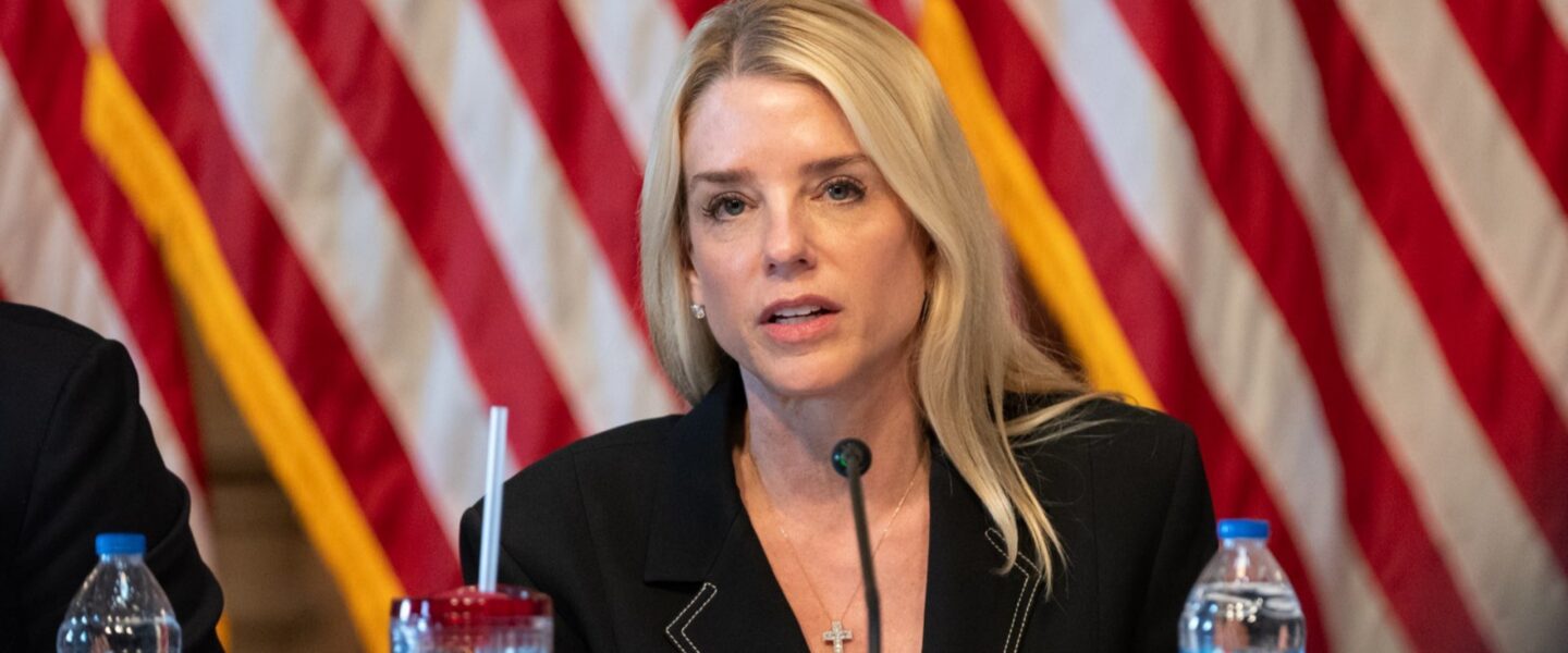 Pam Bondi, podium, speaking