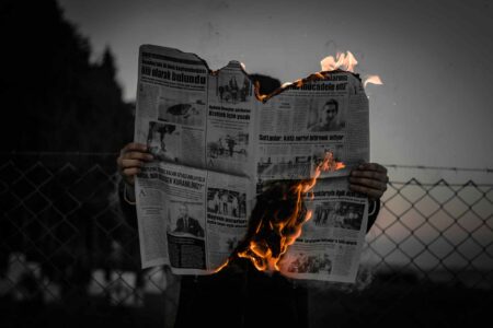 newspaper, headlines, dull the senses
