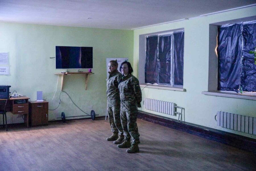 Lesia, Anya, stand at attention, Ukraine
