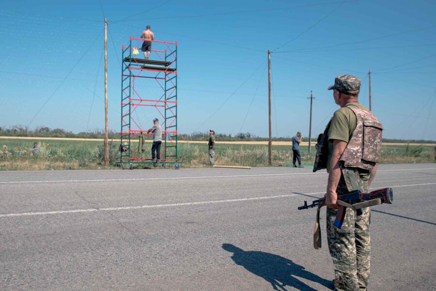 Guards, protect, teams installing drone nets