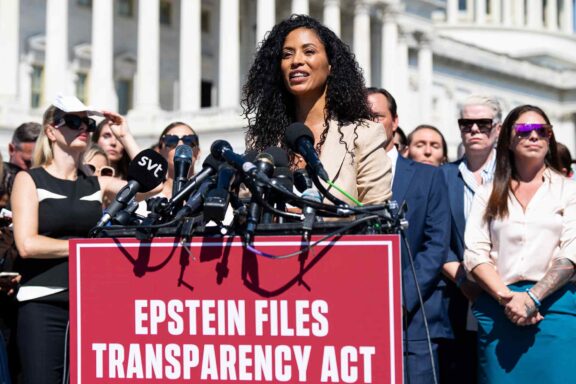 Lisa Phillips, speaks, news conference, Epstein survivors