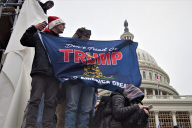 Trump Creates Slush Fund for Criminal Supporters January 6th, MAGA, Flag