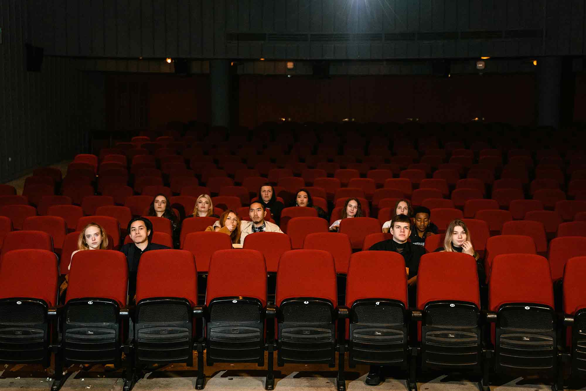 small audience, movie theater