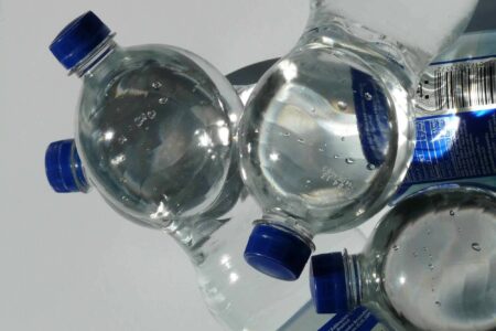 Four, plastic, water bottles
