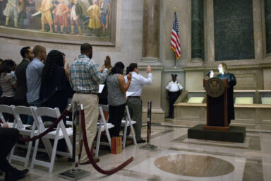 Citizenship candidates, take the oath of allegiance, naturalization ceremony