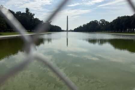 Reflecting Pool. Washington Monument, Chain link fence