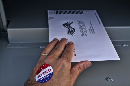 U.S. voting, November midterm elections, mail-in ballots, executive order, new rules, federal lawsuit, 24 states