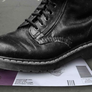 Jack boot, mail-in ballot, voter suppression